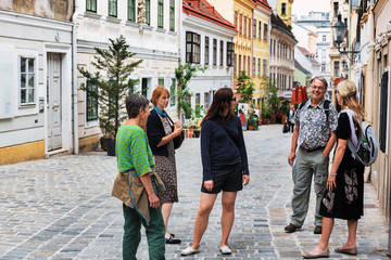 Naklejka premium Vienna, Spittelberg, Tourists in Spittelberggasse