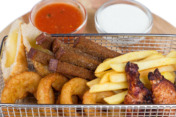 mix from snacks for beer in metal basket