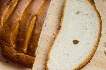 Piece of white loaf of bread on the table