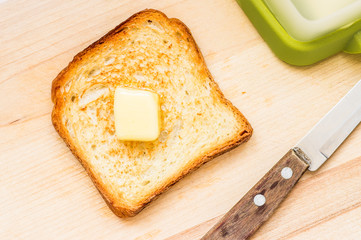 Fried slice of toast with butter