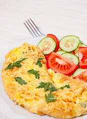 Omelet with cheese and vegetables