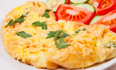 Omelet with cheese and vegetables