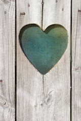 The wooden door with heart. Background