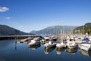 Fototapeta na wymiar Como Lake landscape. Water and mountains. Gera Lario, Lombardy,