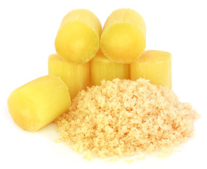 Piece of sugarcane with brown sugar