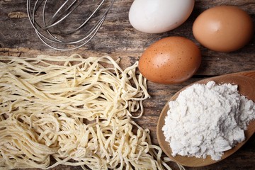 Making noodle with eggs and wheat flour