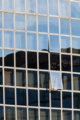 glass facade with opened windows