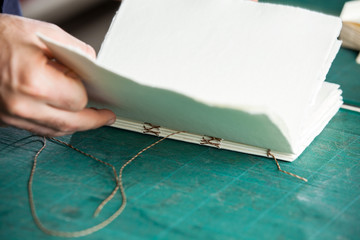 Hand Manufacturing Book On Table