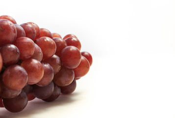 Grapes on white background, selective focus point