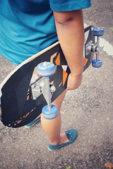 Young girl with skateboard