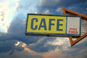 aged and worn vintage photo of neon cafe sign