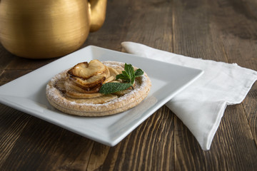 Apple cake with mint with tea