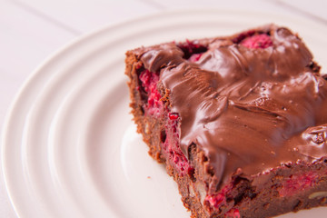 Brownie with raspberries