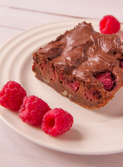 Brownie with raspberries