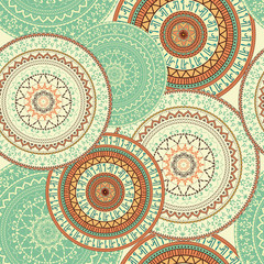 Mandala. Indian, Arabic, Persian pattern. Arabesque. Colorful seamless background with circular ornaments in ethnic style.