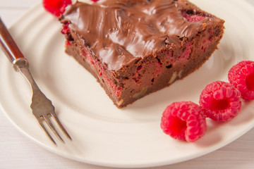 Brownie with raspberries