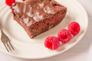 Brownie with raspberries