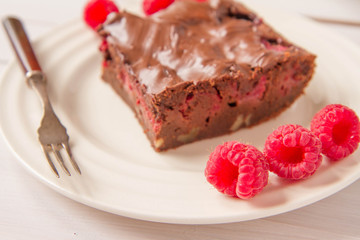Brownie with raspberries