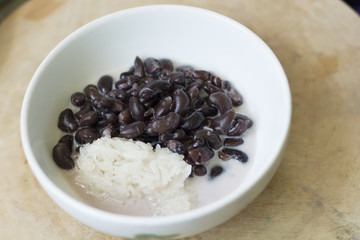 Sticky rice, black beans, candy