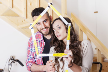 young couple moves into new home