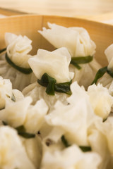 Chinese dumplings in bamboo steamers