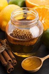 honey with citrus fruit and cinnamon