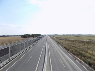 Highway between fields