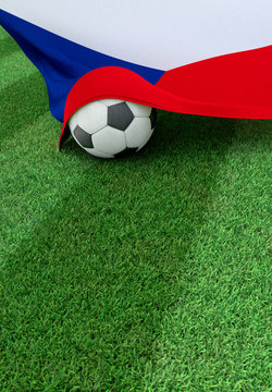 Soccer ball and national flag of Czech Republic,  green grass