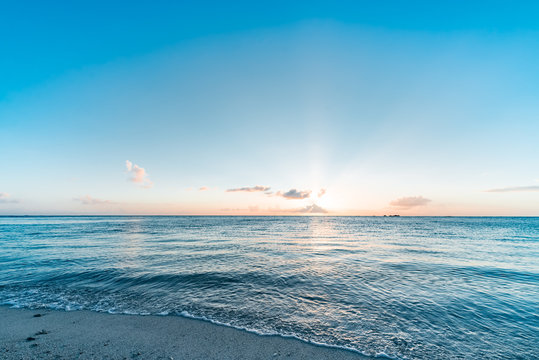 Fototapeta Sunset, sunlight, sea. Okinawa, Japan, Asia.
