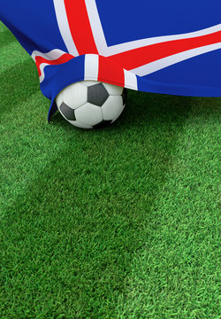Soccer ball and national flag of Iceland,  green grass