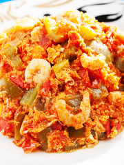 Shrimps with tomato and peppers