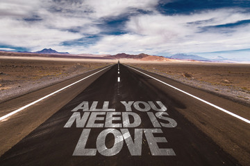 All You Need is Love written on desert road