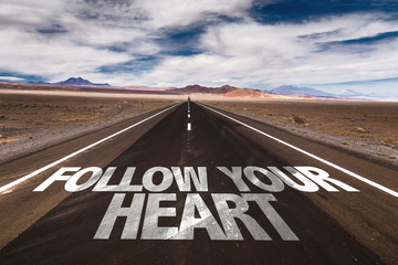Follow Your Heart written on desert road