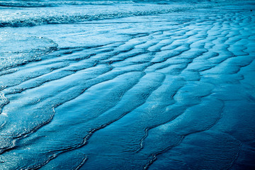 Blue beach in the evening
