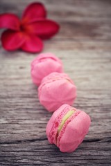 French macaroons with pink flowers