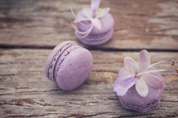 French macaroons with purple flowers