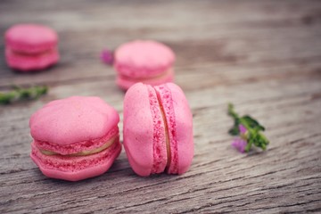 French macaroons with pink flowers