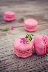 French macaroons with pink flowers