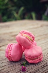 French macaroons with pink flowers