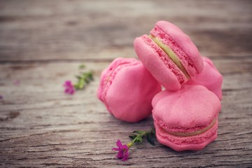 French macaroons with pink flowers