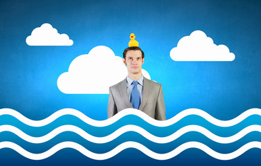 Businessman with duck