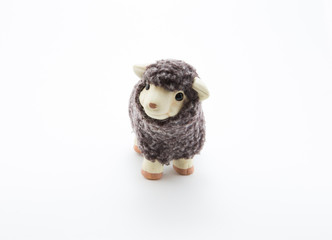 Cute toy sheep with white background