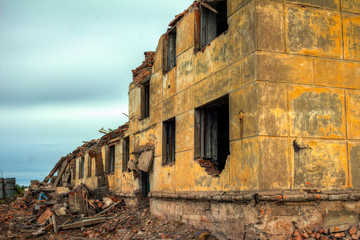 Fototapeta na wymiar Ruins.Destroyed buildings.Debris and dust