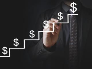 Business man hand drawing  graph