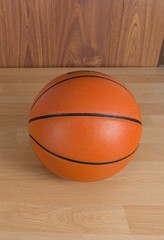 Close up Basketball on wooden floor background