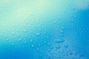 Drops of water on blue floor