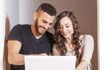 young couple plans to computer the future in new home