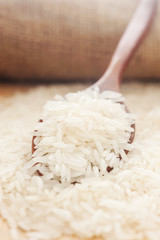 Rice, White rice in wooden spoon with hemp