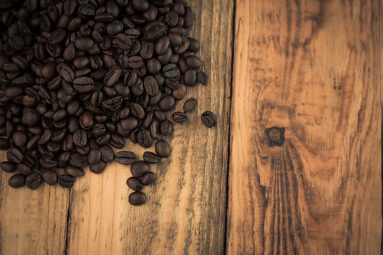 Coffee on wooden table ( Filtered image processed vintage effect