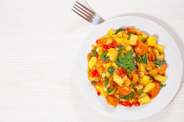 stewed vegetables. zucchini, peppers, onions, carrots, potatoes.